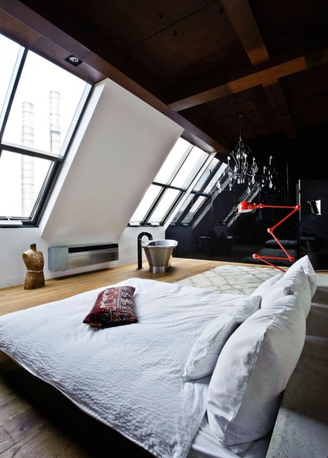 ديكور غرفة نوم مودرن تتميز بالجدران المائلة