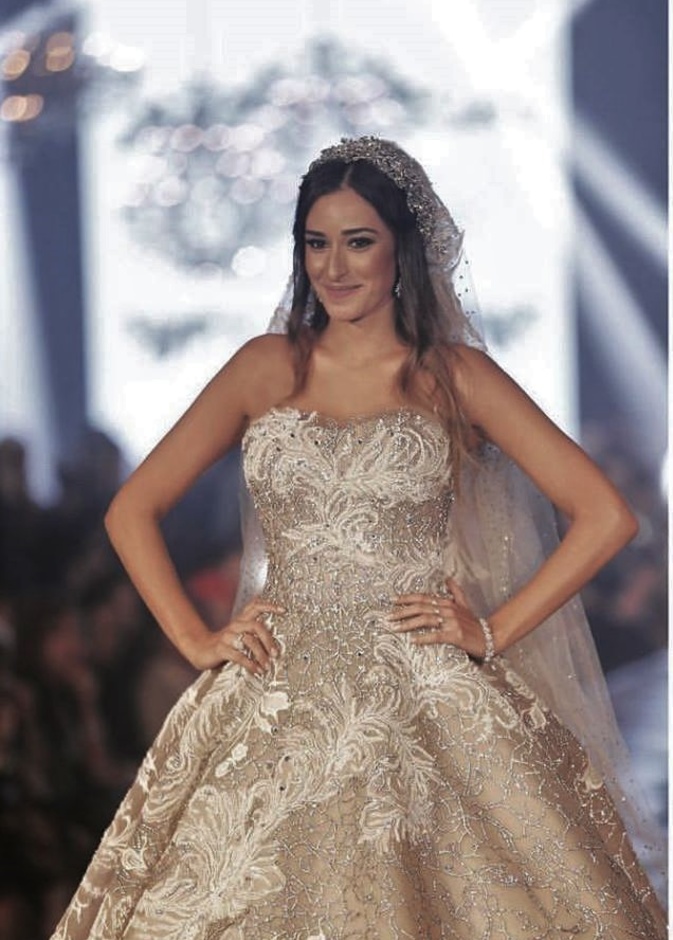  شاهدي كيف بدت اطلالة سابقة لـ أمينة خليل بفستان الزفاف