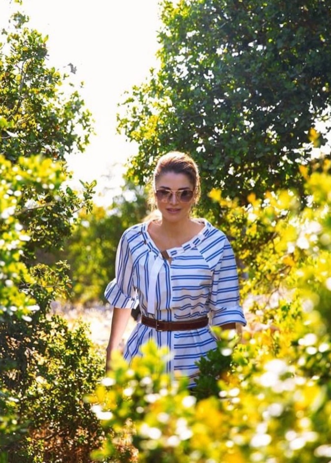 صور إطلالات الملكة رانيا بالتصاميم المقلمة