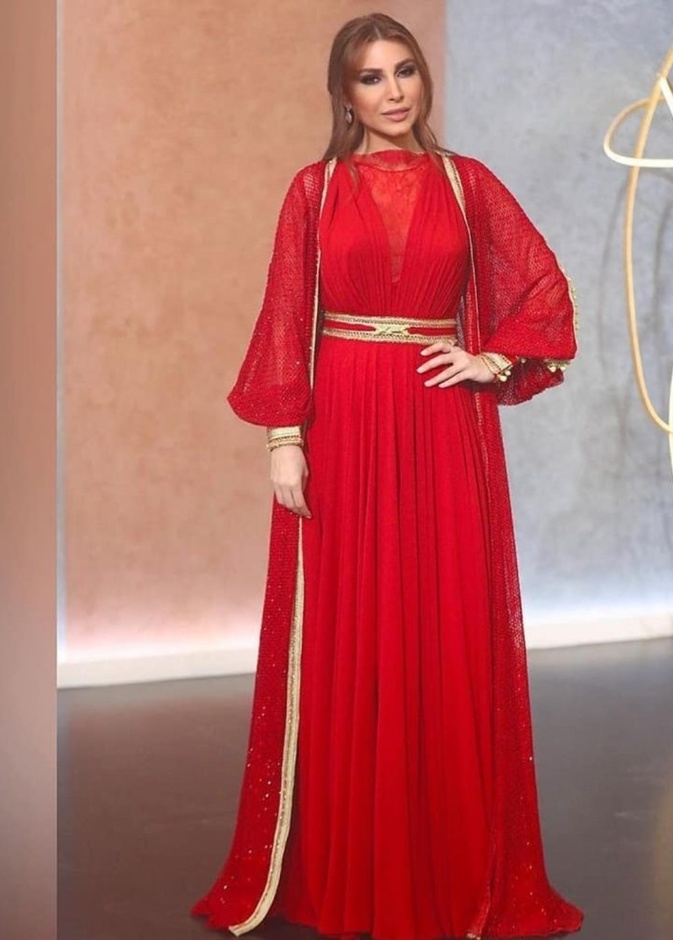 صور اجمل اطلالات يارا بفساتين من اللون الاحمر