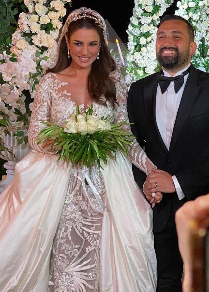 العروسان درة التونسية وهاني سعد