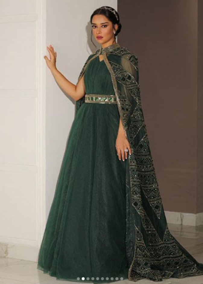  بلقيس بفستان باللون الاخضر