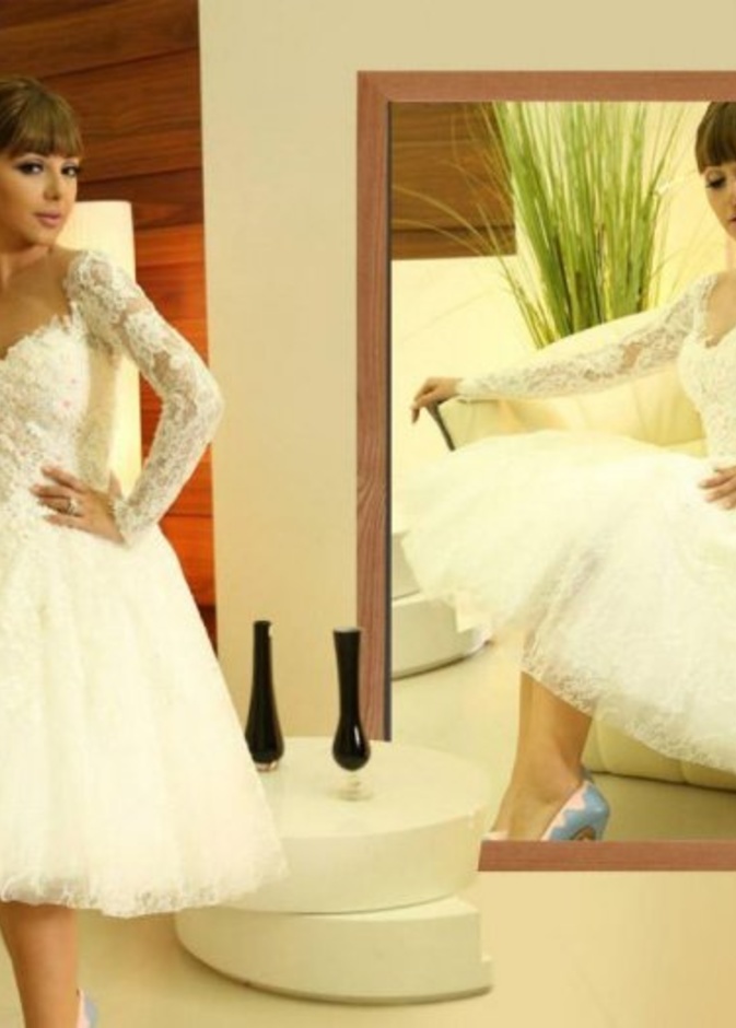 فستان زفاف مي عمر.