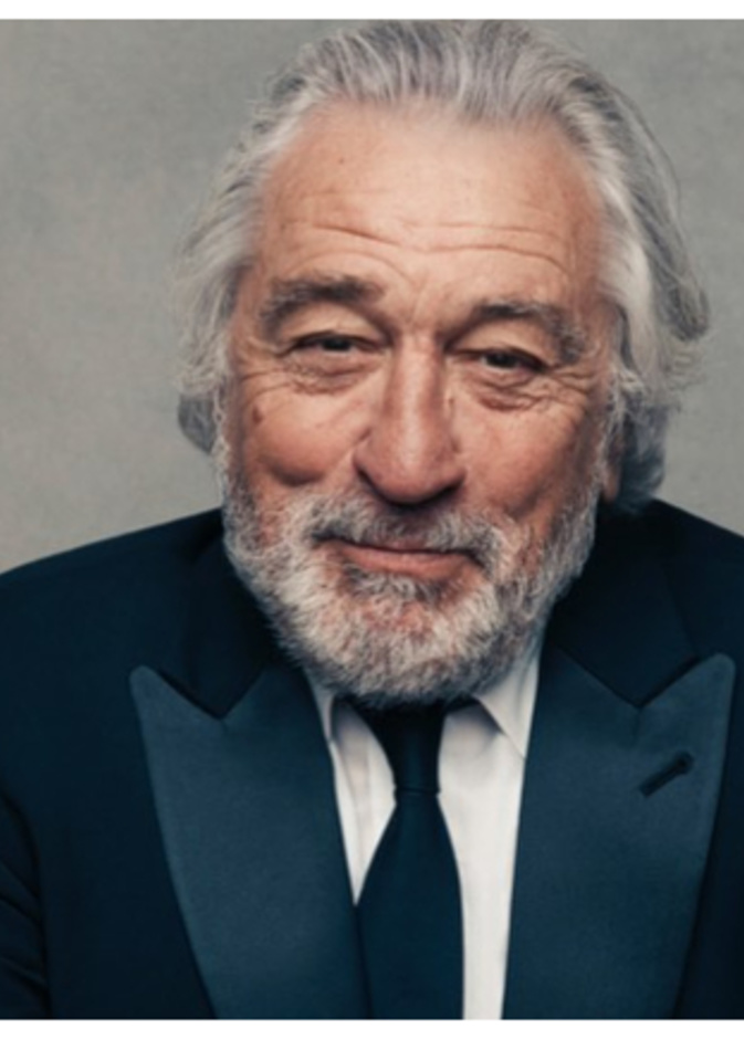 صور روبرت دي نيرو في عيد ميلاده مع امرأة غير معروفة تثير علامات استفهام كثيرة