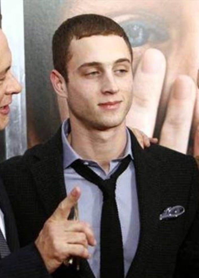 توم هانكس وزوجته وابنه