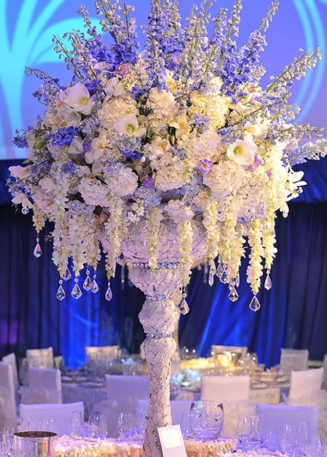  لتزيّني طاولات الزفاف بالورود