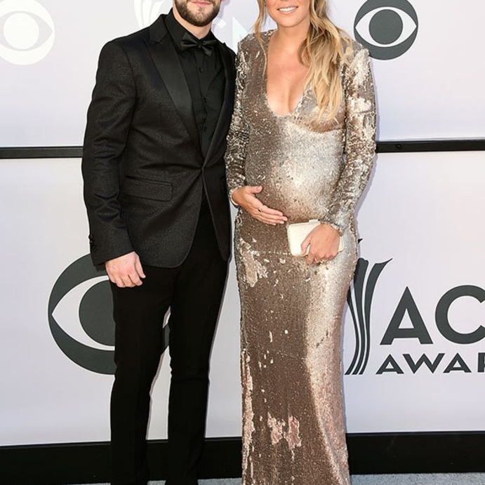 توماس ريت وزوجته لورين على السجادة الحمراء