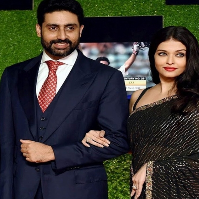 أتت اطلالات آيشواريا راي وزوجها ملفتة مع التصاميم البراقة والخطوط المزخرفة وتألق زوجها ببدلة كحلية رسمية مع ربطة العنق المنقوشة.