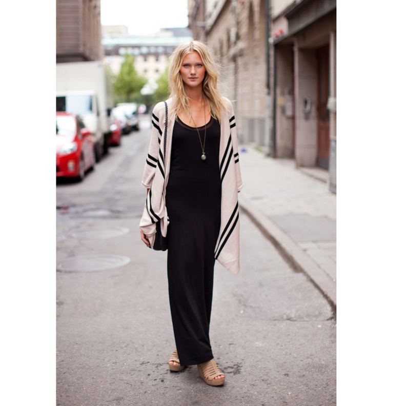 تألقي باطلالة عفوية هذا الموسم مع تصاميم الفساتين الماكسي