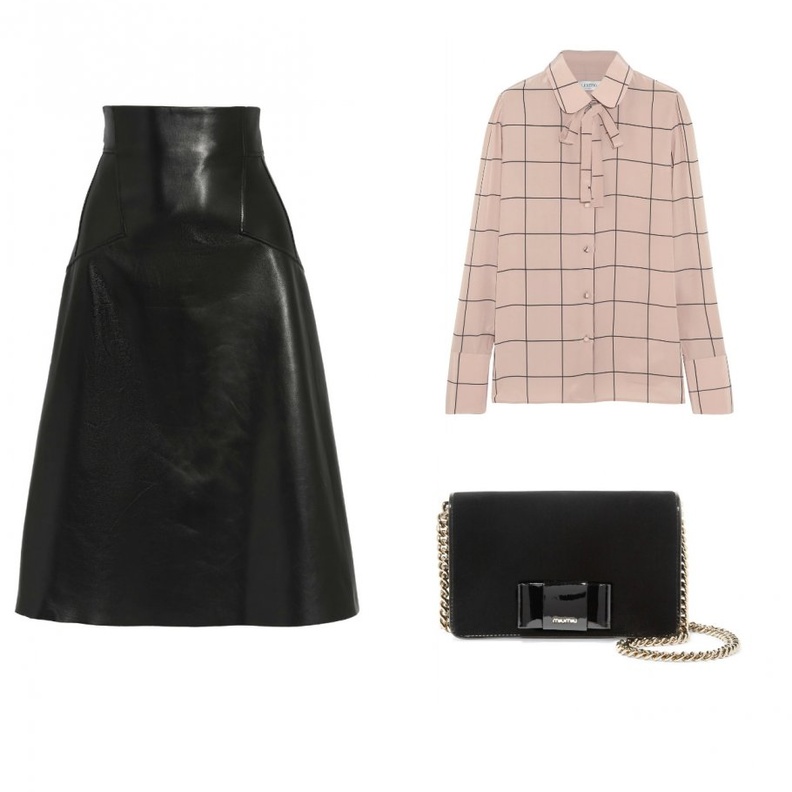 اطلالة راقية بالتنورة الجلدية المتوسطة الطول