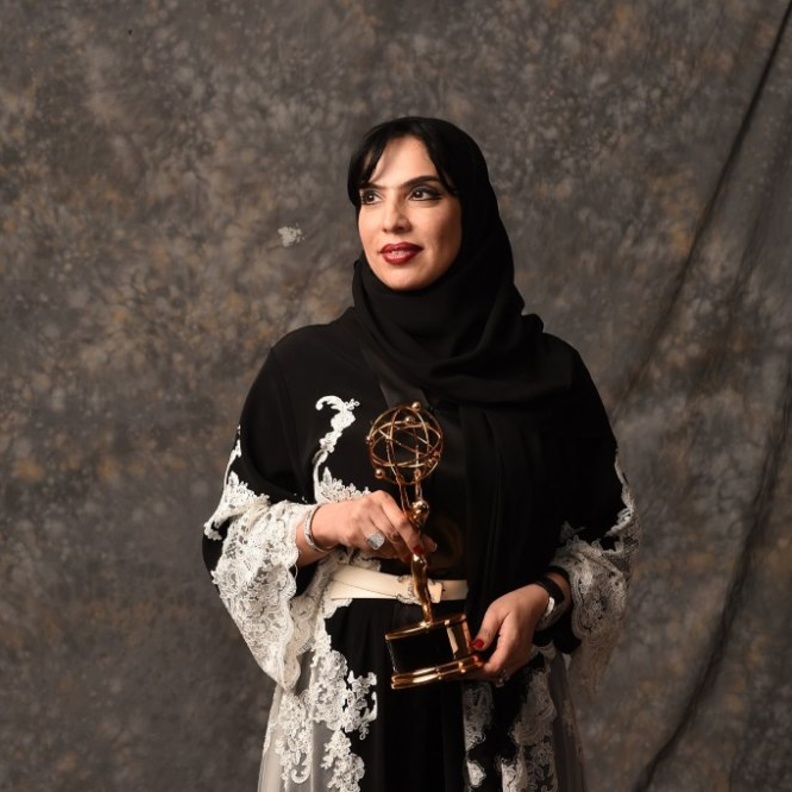 مريم مع أحد الأطفال