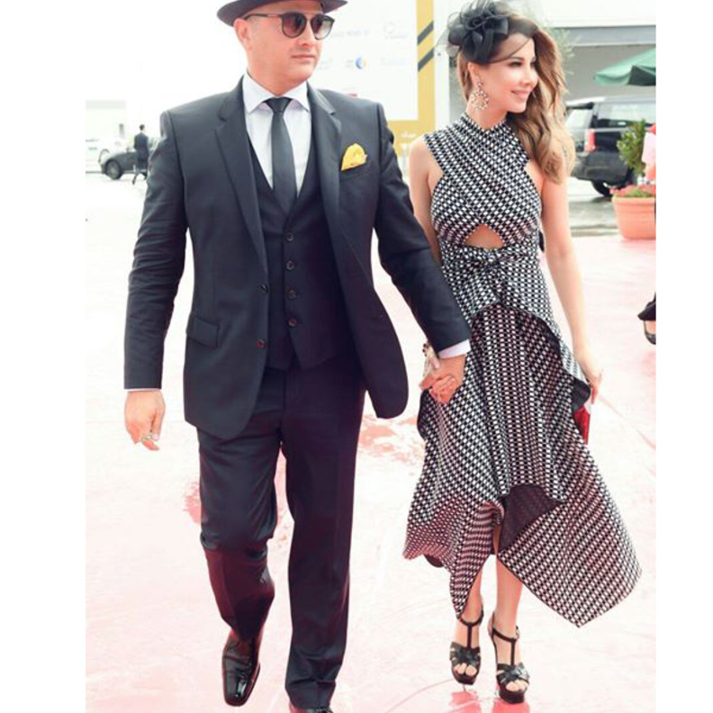 نانسي عجرم بموض‎ ‎‏ الفستان المقلم بين الأبيض والأسود من برونزا سكولير ‏PROENZA SCHOULER