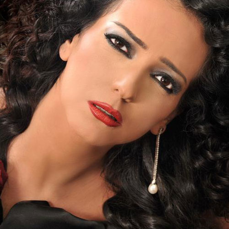 أمل عرفة مع زوجها عبدالمنعم عمايري