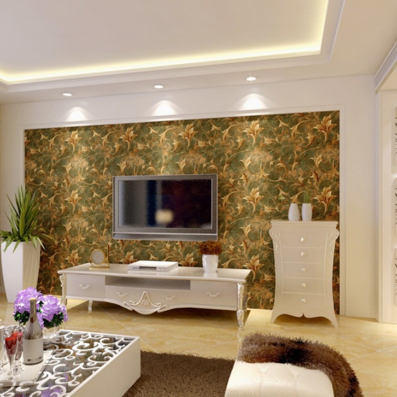 اختيار منسجم لورق الجدران على الجدار خلف التلفاز ليلائم بتدرجات ألوانه الورق المختار على الجدار المجاور 