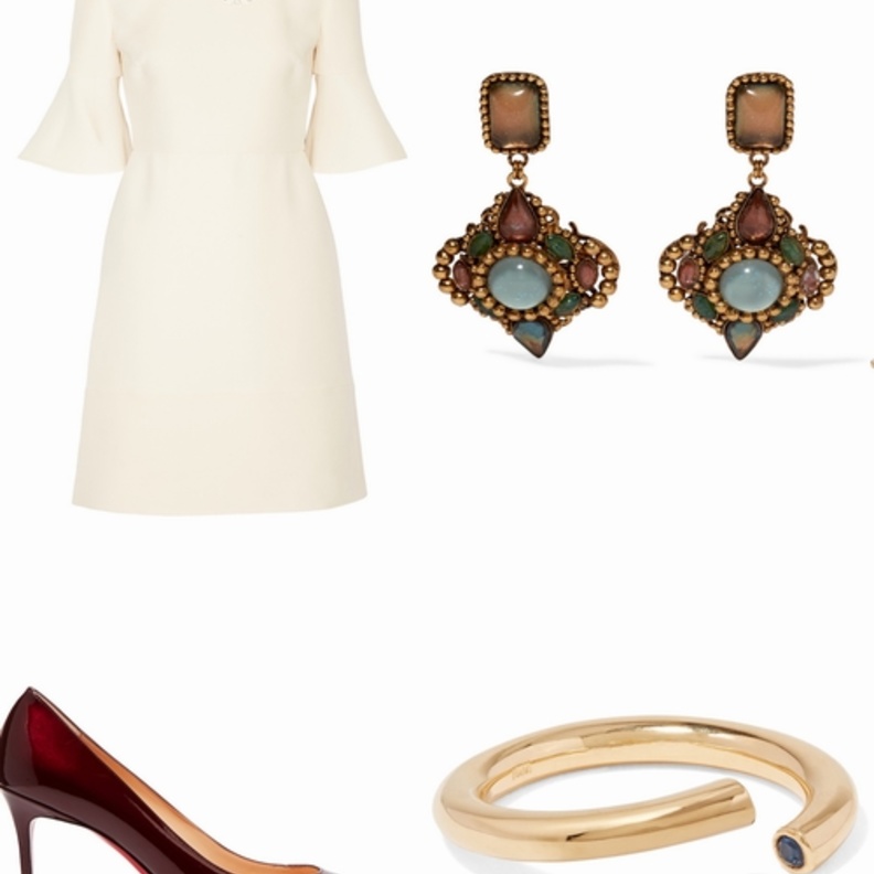 اطلالة راقية  بفستان أبيض أنيق