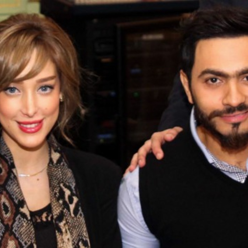 تامر حسني وبسمة بوسيل يتعمدان اخفاء وجه ابنتيهما