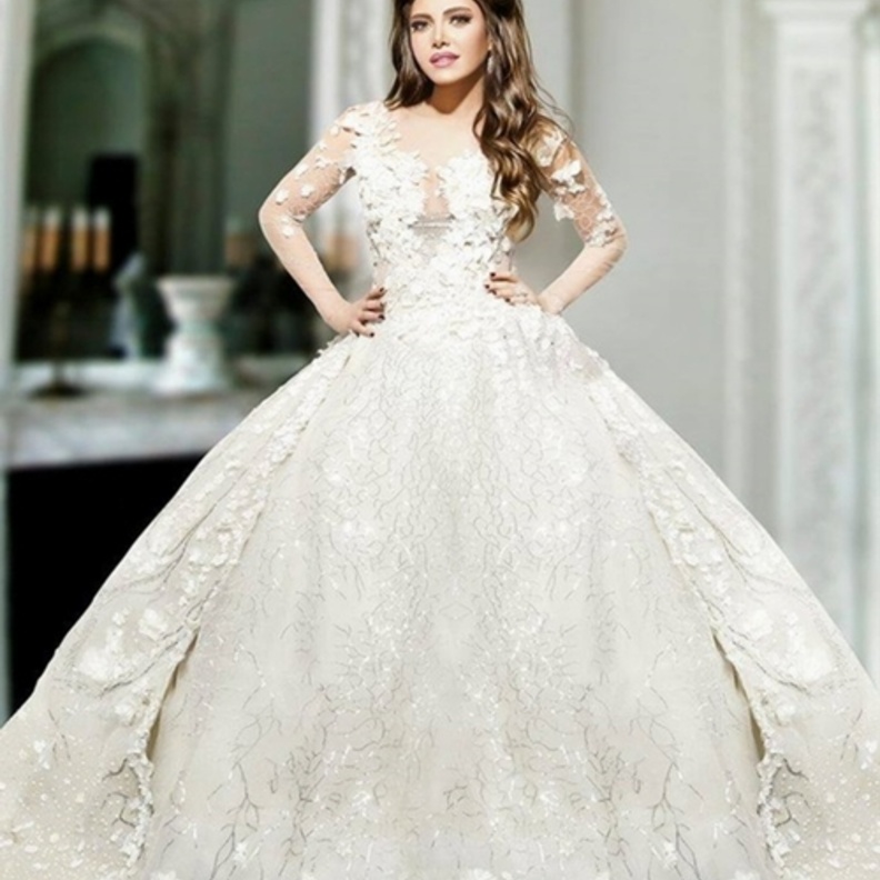 ريهام حجاج فاجأت الجمهور بصورها وهي ترتدي فستان زفاف