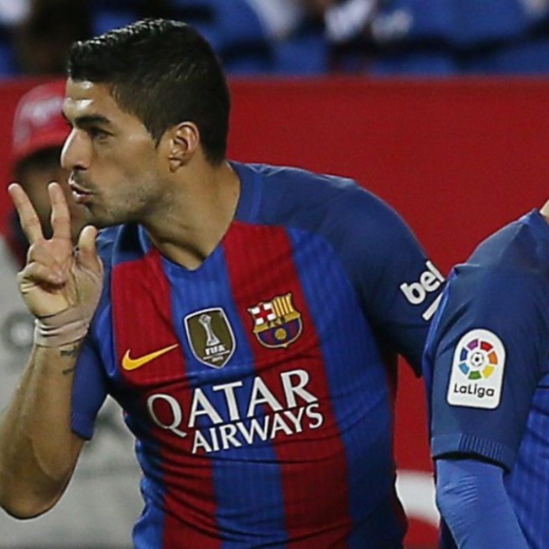 ميسي و سواريز ينقذان برشلونة أمام اشبيلية