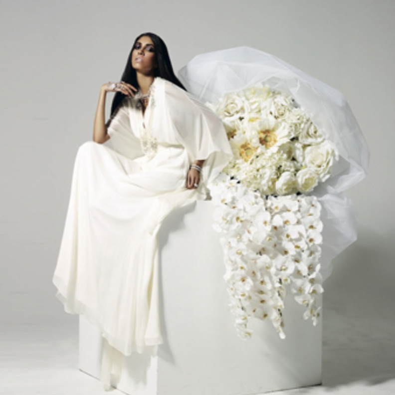 الفستان تصميم ”ماثيو ويليامسون” Matthew Williamson لدى Net-A-