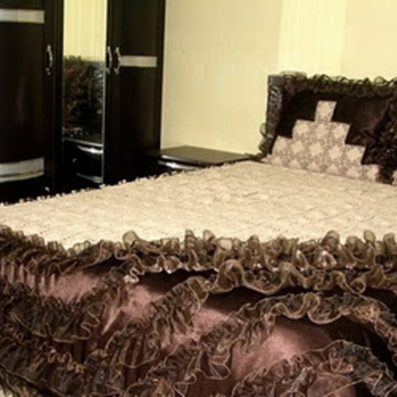 كيفية انتقاء وتنسيق غطاء السرير