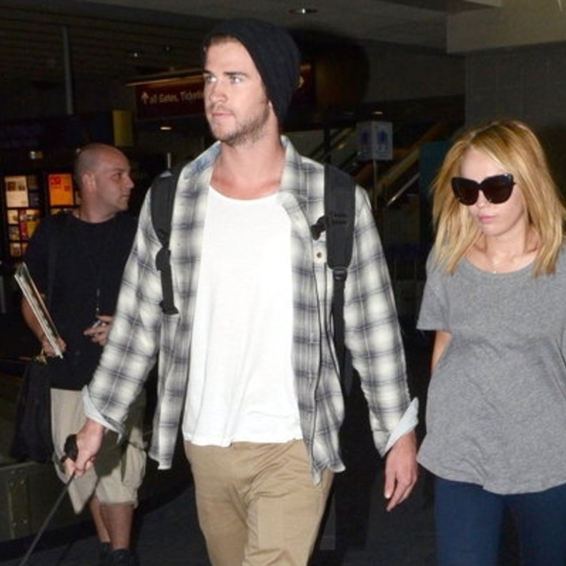 Miley Cyrus with her fiance Liam Hemsworth