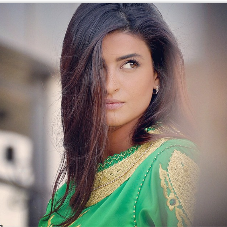 علا فارس تختفل بالعيد الوطني السعودي بالزي الاخضر