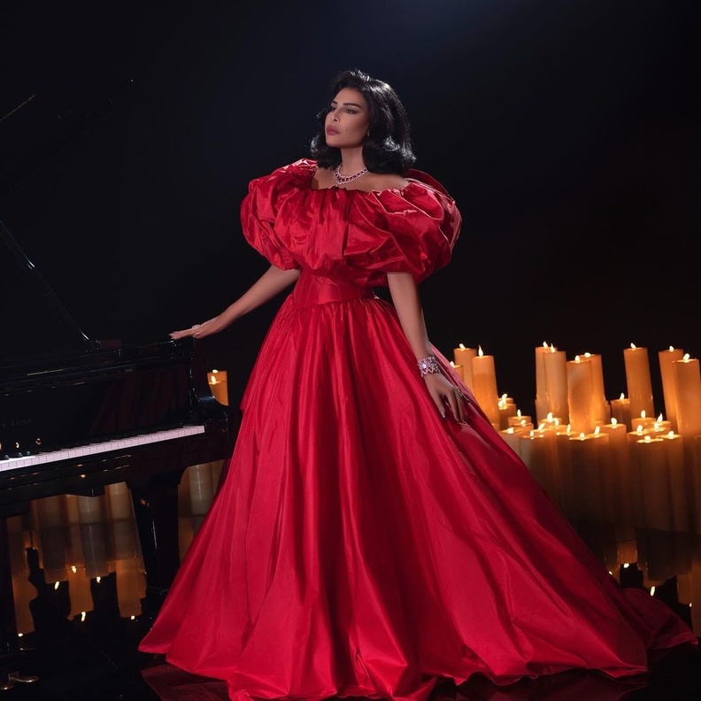 فساتين خطوبة حمراء انستقرام@ahlamalshamsi