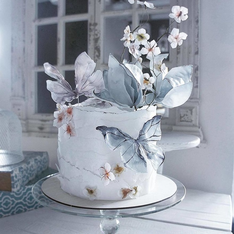 أفكار كيكات زفاف بثيم الفراشات