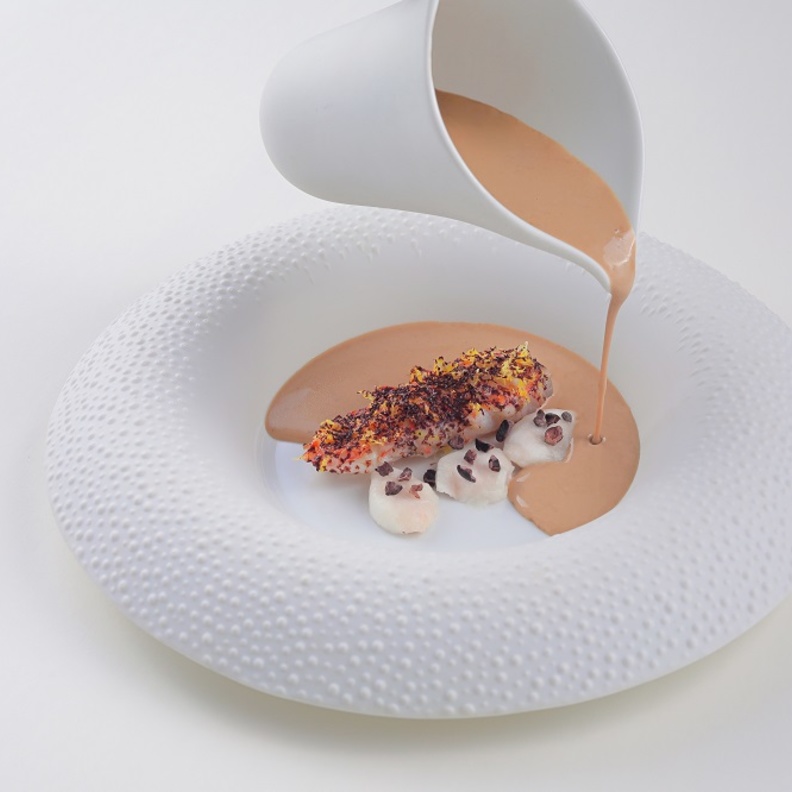 استكشف مطاعم أبوظبي الرائدة لتجربة تناول طعام حائزة على نجمة ميشلان