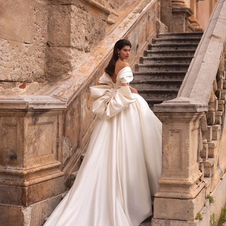 فساتين زفاف بصيحة الفيونكات من مجموعات 2023