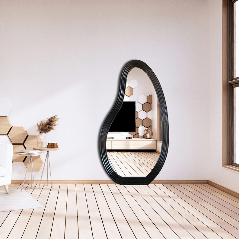 تصميم مرآة تشكل قطعة فنية ضمن ديكور المنزل