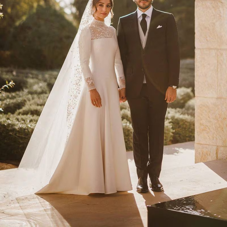 الأميرة إيمان أكثرهن أناقة.. أفضل فساتين زفاف المشاهير لعام 2023