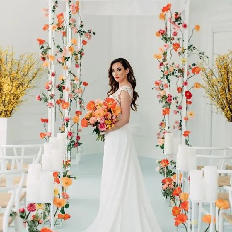 هل ترغبين في إعداد ديكور مبهر لممر العروس في زفافك يتضمن عناصر مختلفة