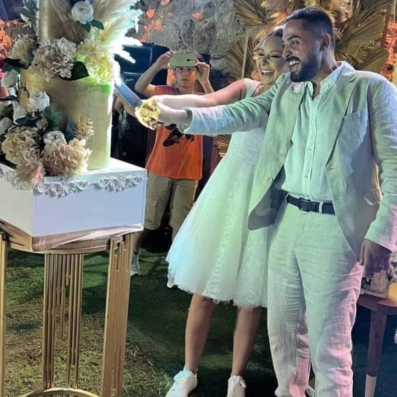 نادين تحسين بيك واياد عيسي في حفل زفافهما 