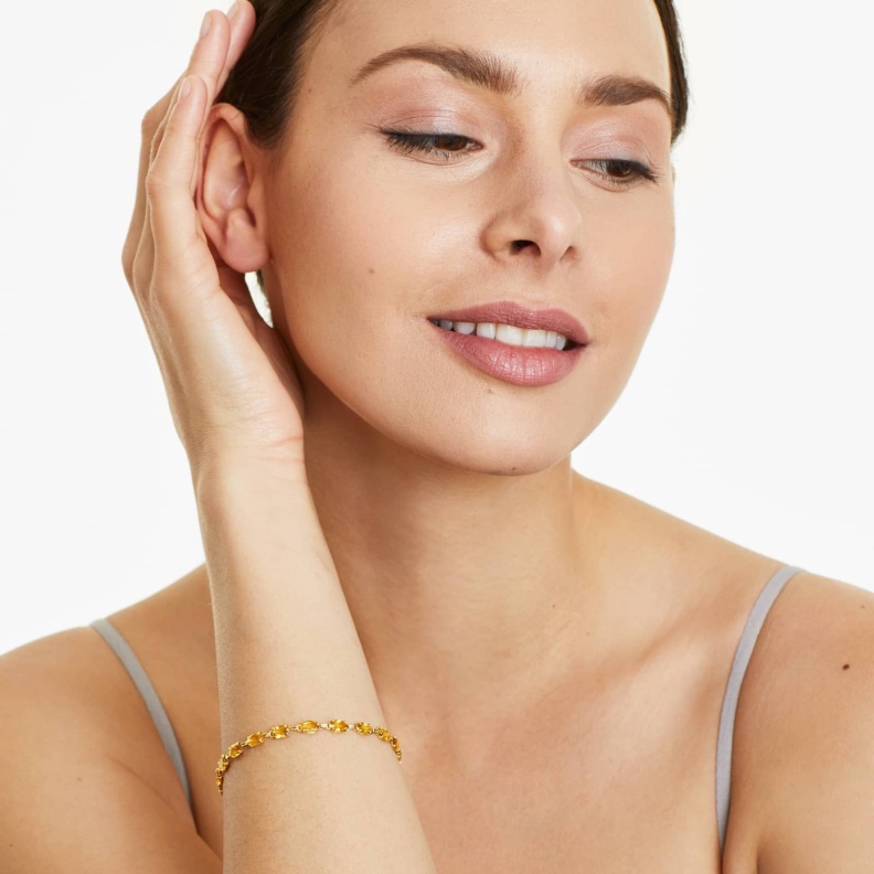 تألقي بموديلات أساور مرصعة بحجر السترين البرتقالي لهذا الشتاء.