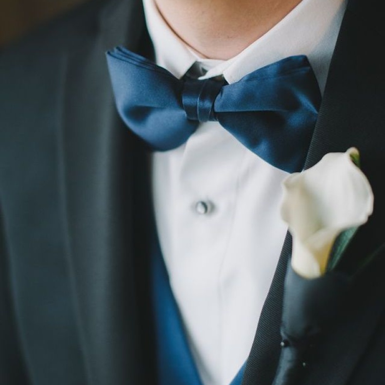 Groom wearing Bow tie
