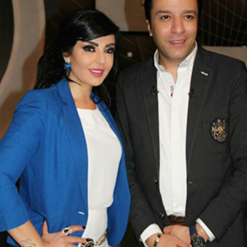 مصطفي كامل مع راغدة شلهوب فى 100 سؤال