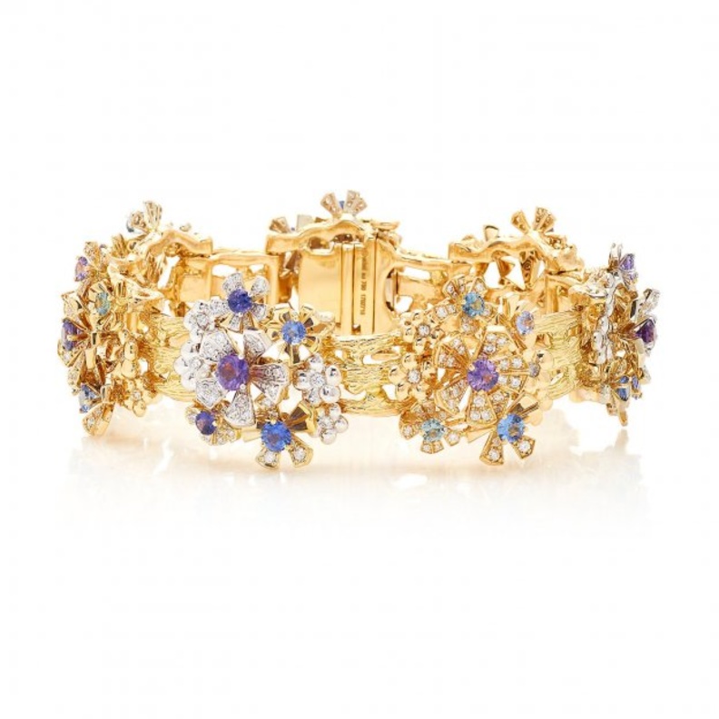 Mimi so سوار ذهب مستوحى من الورود ومزين بالأحجار الكلونة.