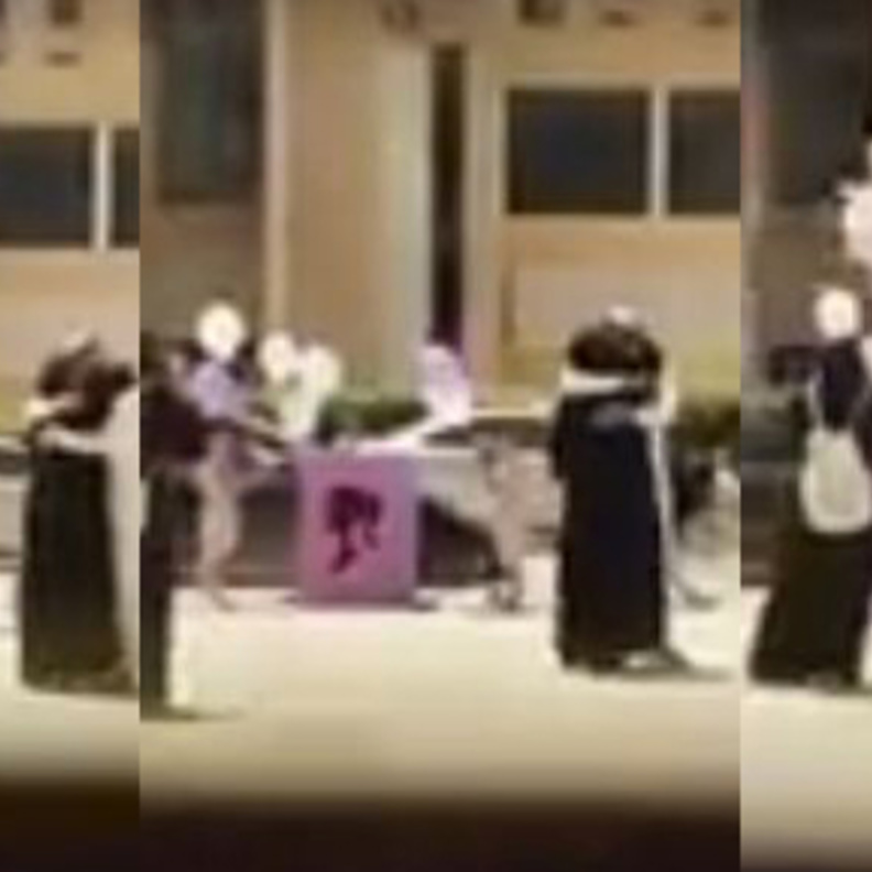 من مقطع الفيديو لشاب يفاجأ زوجته امام الكلية