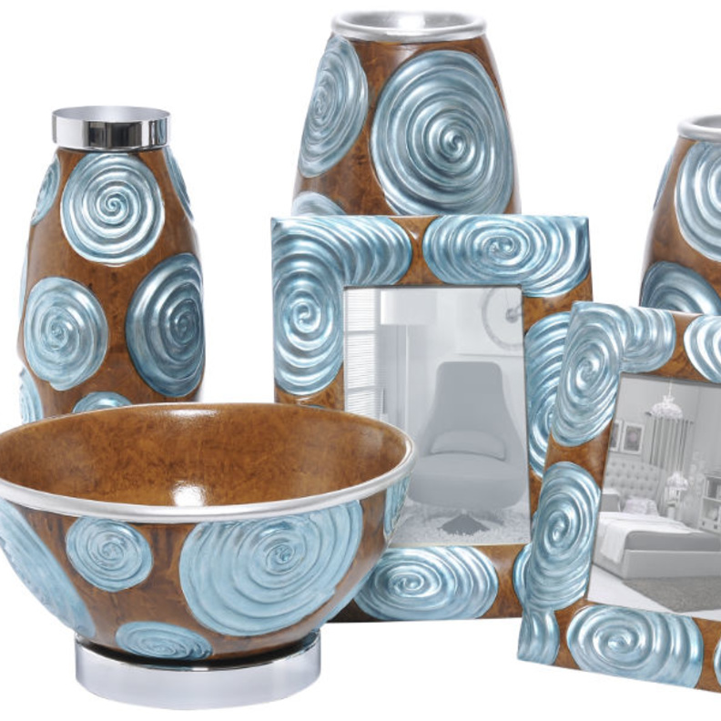 سلسلة من التحف والمزهريات السيراميك بلون التركواز من مجموعة هومز ار اص