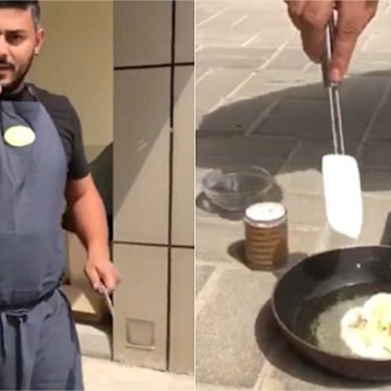 شاب يقلي البيض على حرارة الشمس في دبي