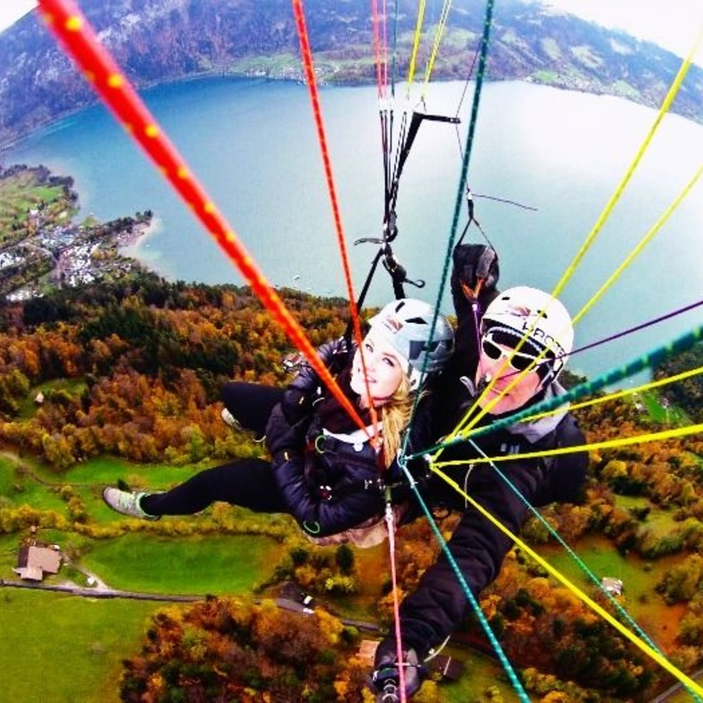 couple paragliding on their honeymoon in Interlaken