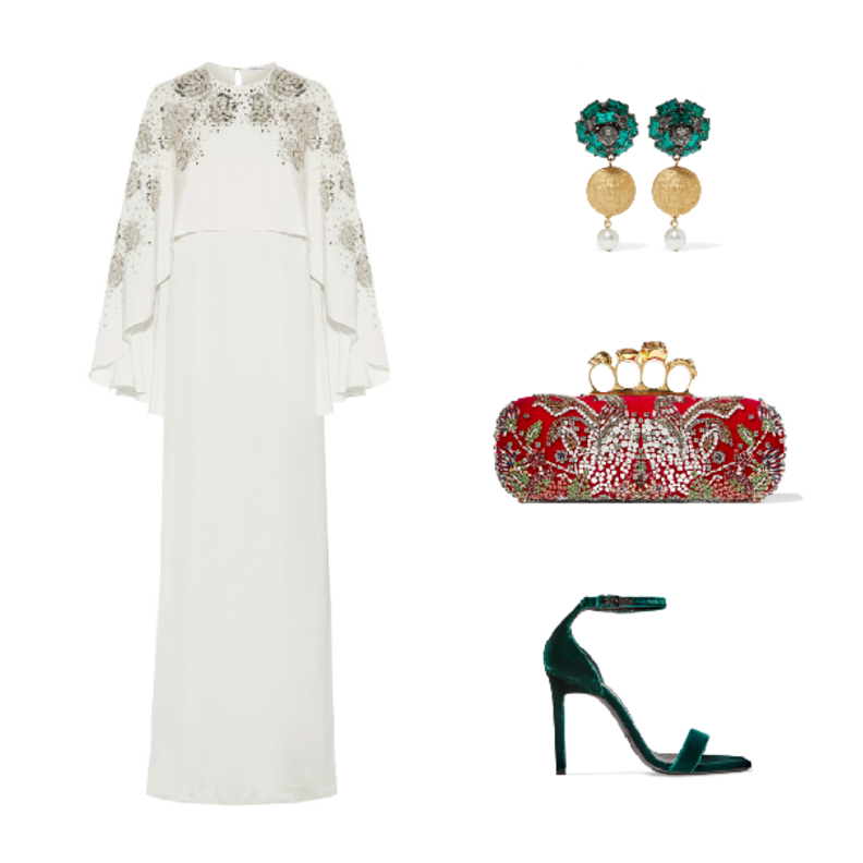 اطلالة مستوحاة من ألوان العمل الاماراتي في الجلابية البيضاء