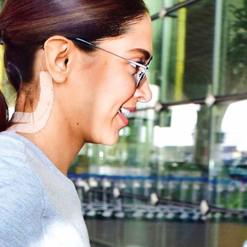 ديبيكا بادوكون تضع ضمادة على عنقها