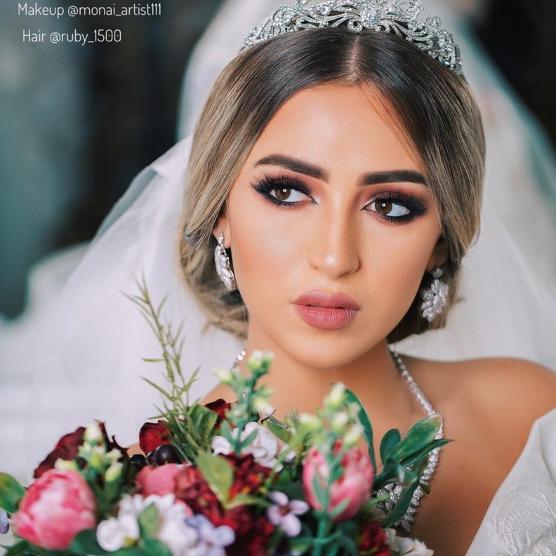 لقطة عروسين من المصورة آمنة جميل