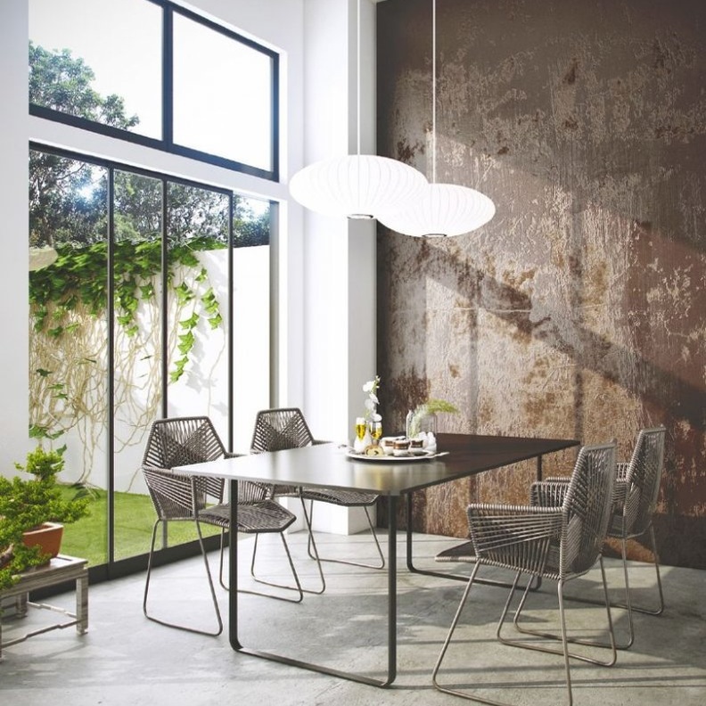 غرفة طعام مودرن تتميز بالخزانة و كراسي القش