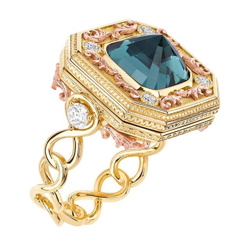 خاتم ديور من الذهب والتوباز الأزرق