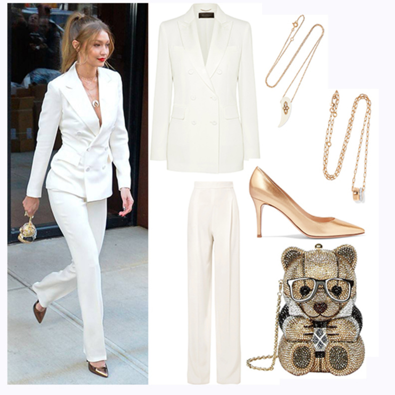 تألقي بالبدلة البيضاء بأناقة جيجي حديد الجذابة