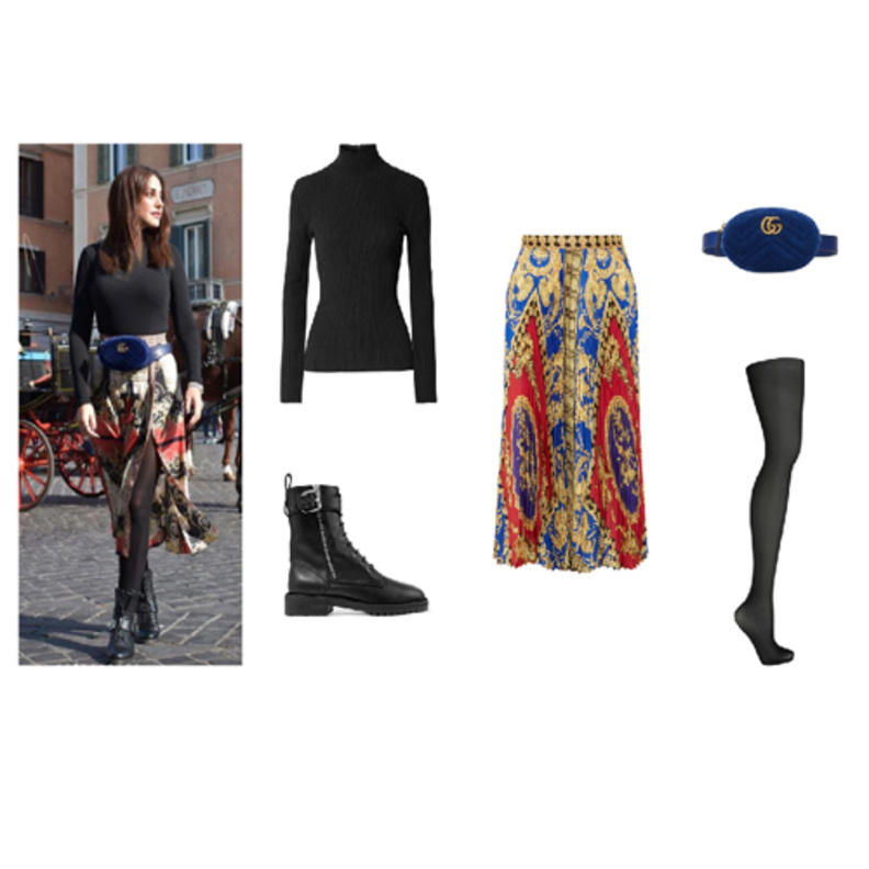 اطلالة بالتنورة الميدي السوداء بأسلوب بثينة الرئيسي