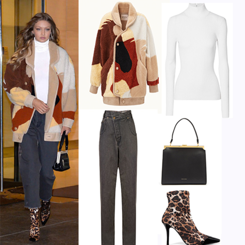 اطلالة خريفية ناعمة اختارتها جيجي حديد في الجينز الرمادي مع الحذاء بنقشة النمر